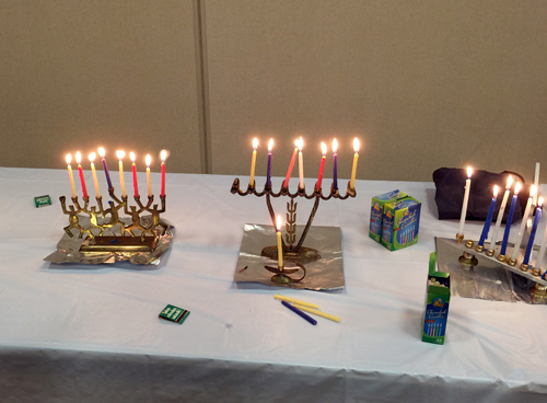 Menorahs with 7 candles lit.
