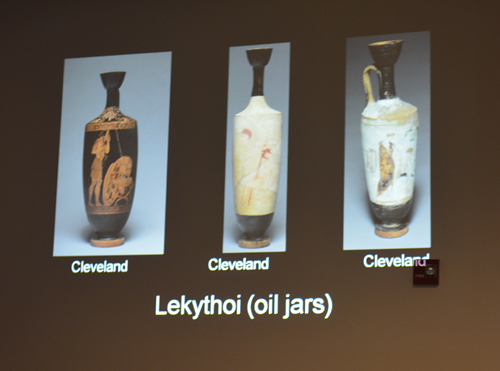 A slide showing tall jars