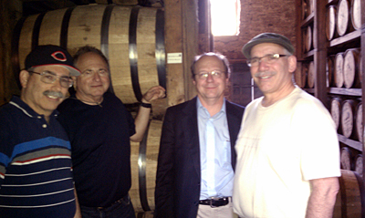 Group in front of barrels