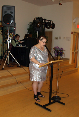 Jeanne Aronoff, as Hostess for the evening, introduced the featured entertainment, comedian John Bunyan.